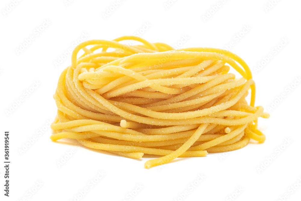 Fresh uncooked spaghetti pasta isolated on a white background