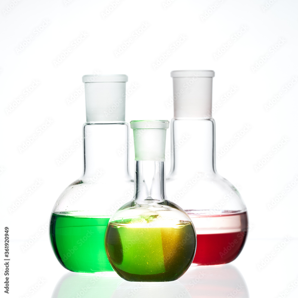 Glass flask with a chemical reagent. Glass flask with a chemical reagent.
