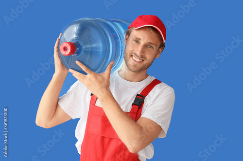 Delivery man with bottle of...