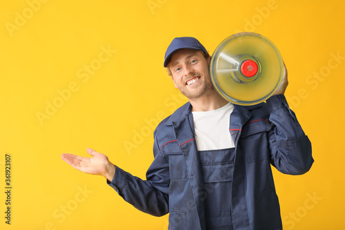 Delivery man with bottle of...