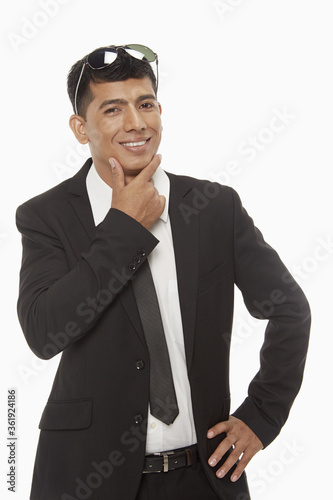 Businessman smiling and showing hand gesture