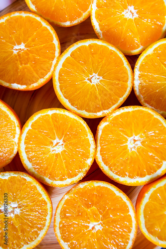 Bunch of fresh sliced oranges on a tray