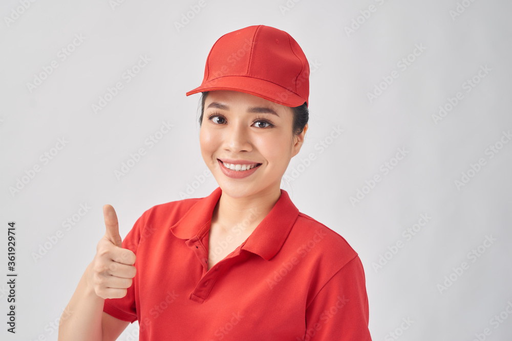 woman in hat smiling showing thumbs up. delivery, moving woman in hat smiling showing thumbs up. delivery, moving