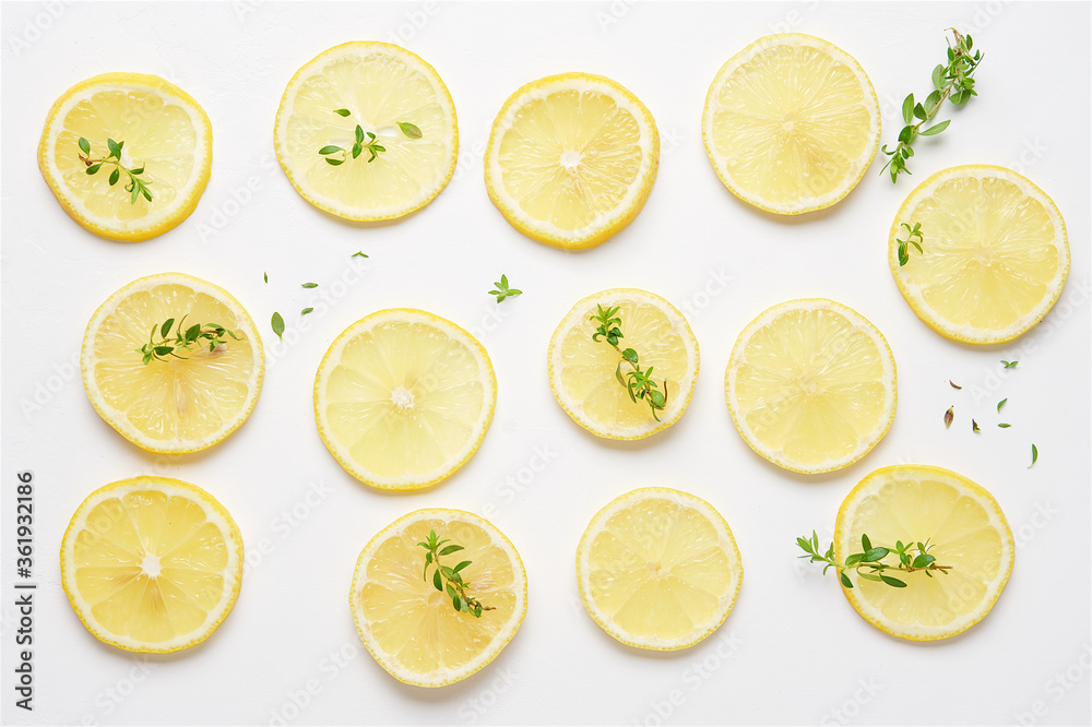Lemon slices on white background. Top View. Bright summer pattern Lemon slices on white background. Top View. Bright summer pattern