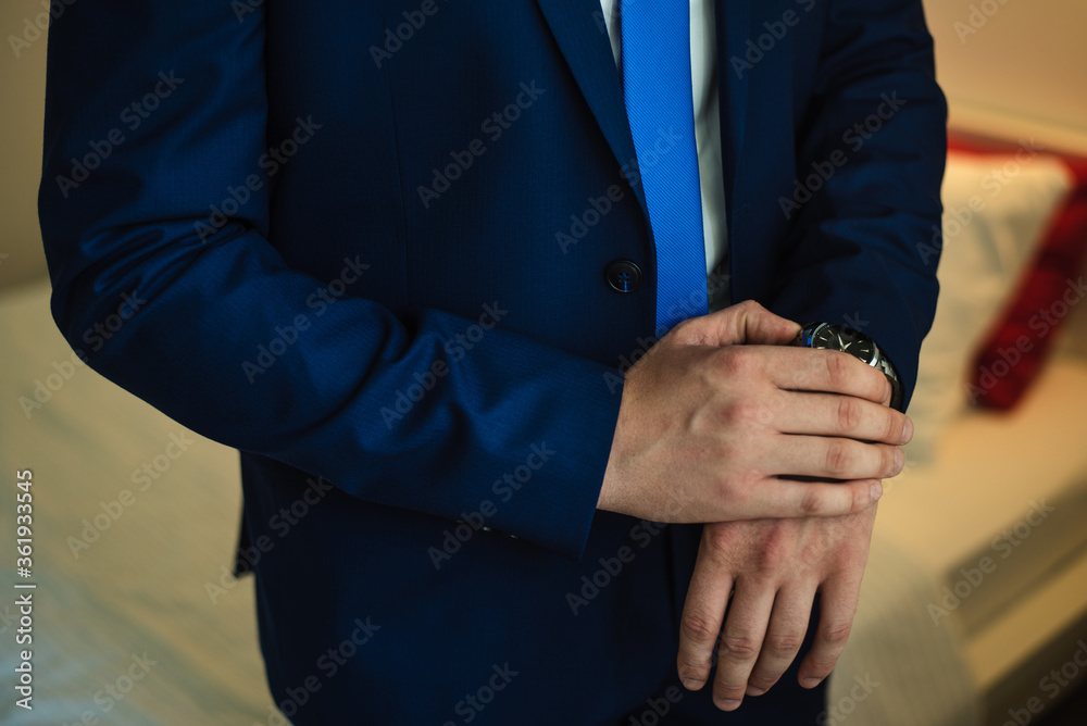 Wrist Watch, man in a jacket, man in a jacket, man watches time, the groom watches the time, wedding day, groom's fees