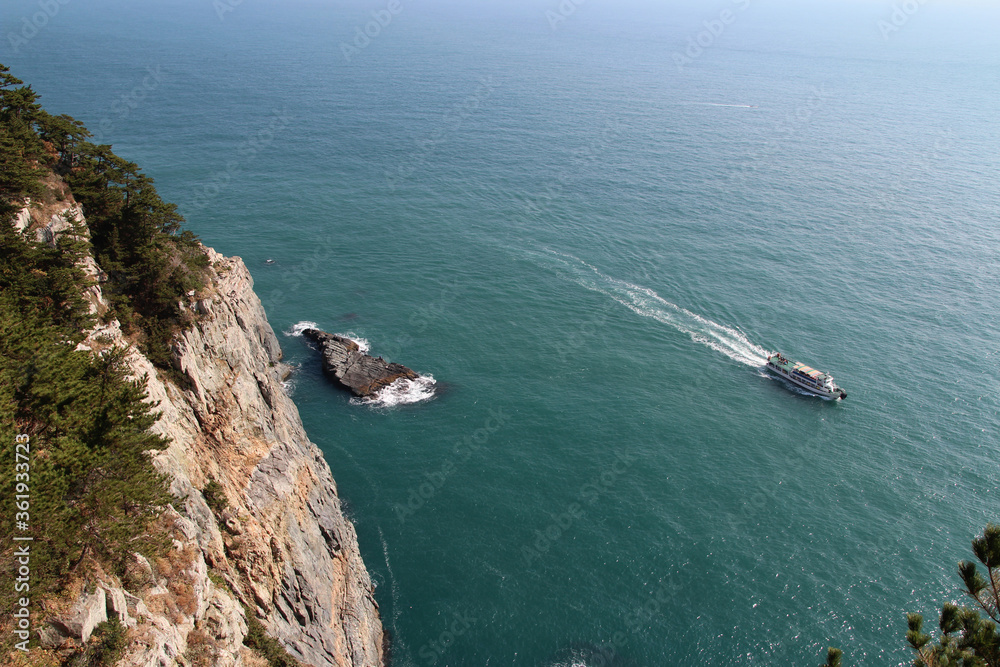 Magnificent cliffs and a cruise on the sea at Taejongdae recreational park, Busan, South Korea