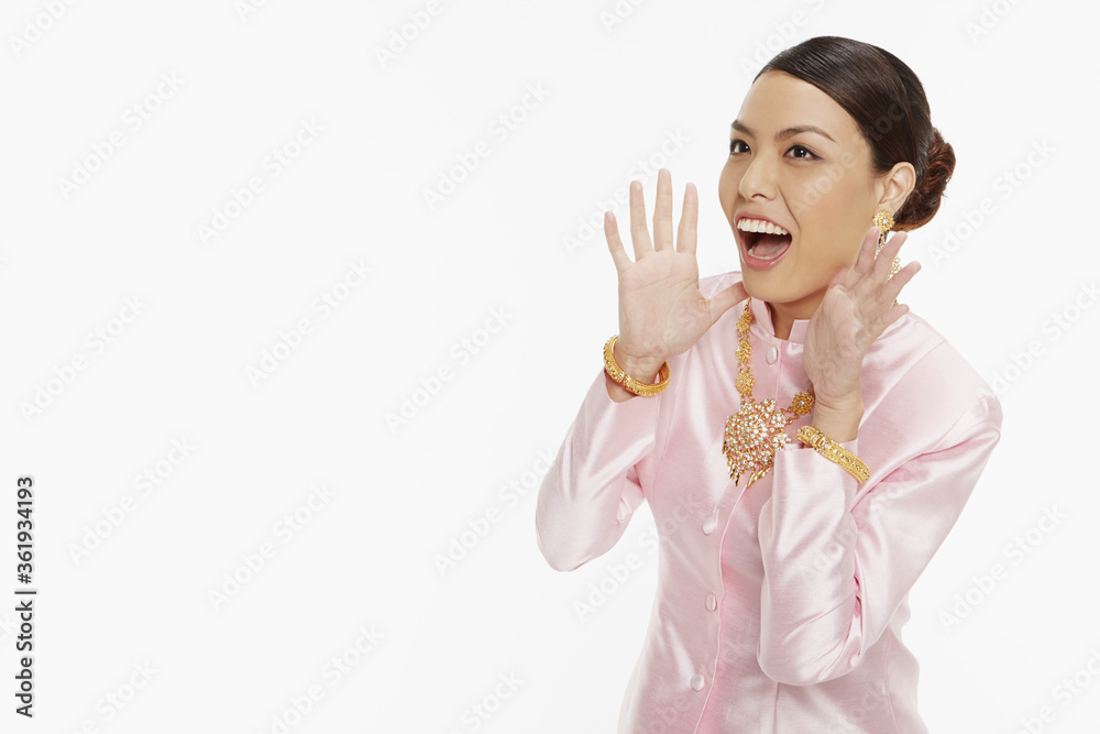 Woman in traditional clothing shouting out Woman in traditional clothing shouting out