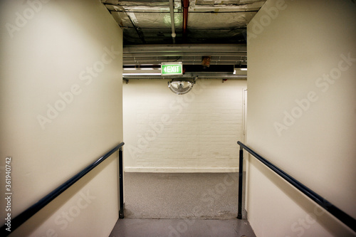 Εκτύπωση καμβά Corridor inside a building with blind corners and a convex safety mirror