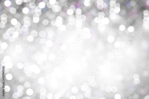 Light abstract glowing bokeh lights. Bokeh lights effect isolated on transparent background. Festive purple and golden luminous background. 