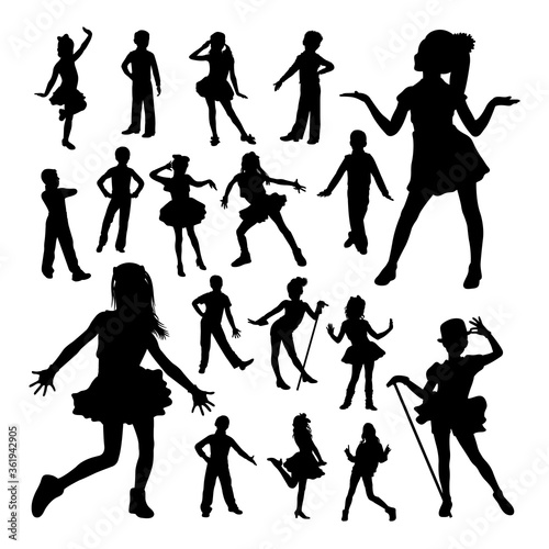 Adorable children dancing silhouettes. Good use for symbol, logo, mascot, sign, or any design you want.