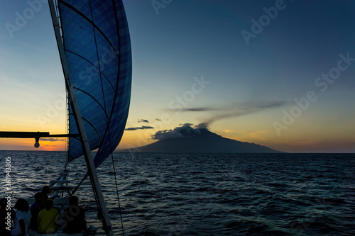 Sunrise from the boat over the Rinjani volcano