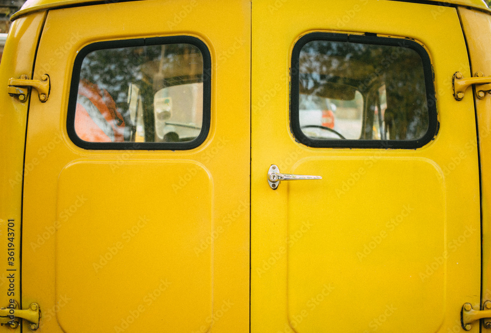 back of a yellow van 