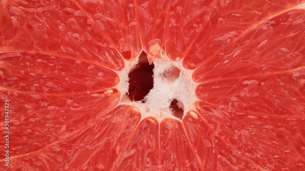 rotating red grapefruit closeup, macro shot rotating red grapefruit closeup, macro shot