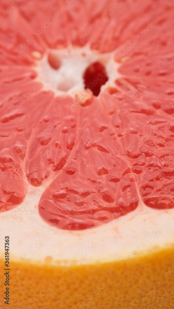 half of red grapefruit closeup, macro shot