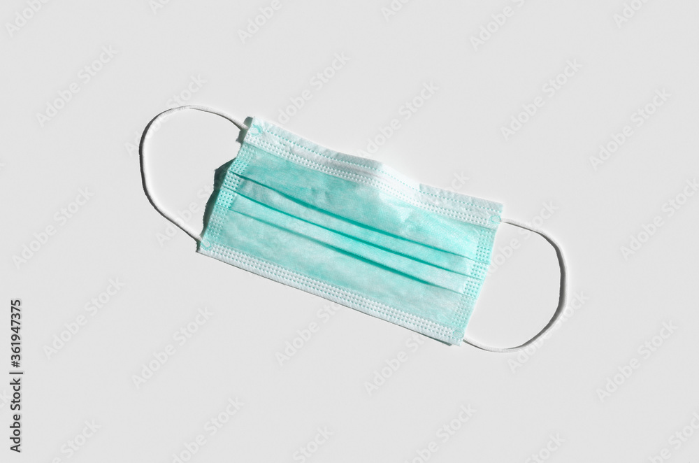 Medical or surgical face mask on a white background. Medical or surgical face mask on a white background.