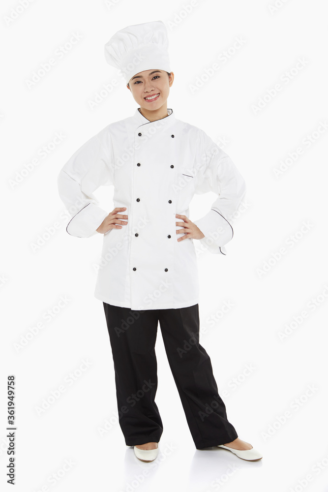 Portrait of a female chef smiling Portrait of a female chef smiling