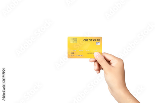 Hand holding credit card isolated on white background.