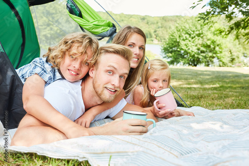 Family with two children camping