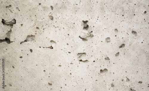 Porous on white concrete surface.