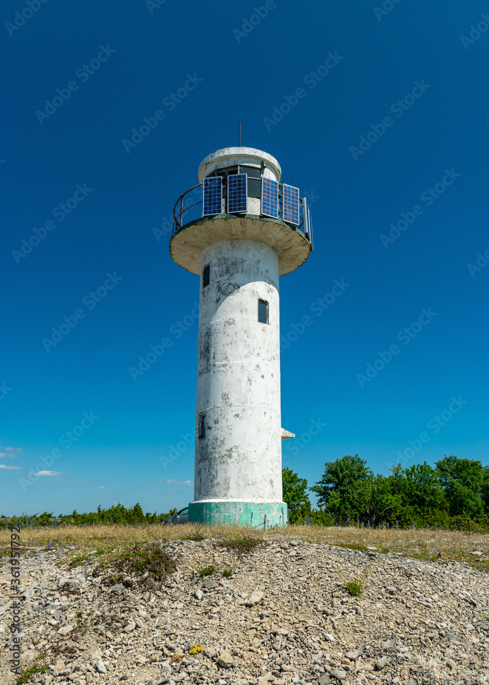 view of an old abandoned lighthouse by the sea, Saaremaa Island, Estonia