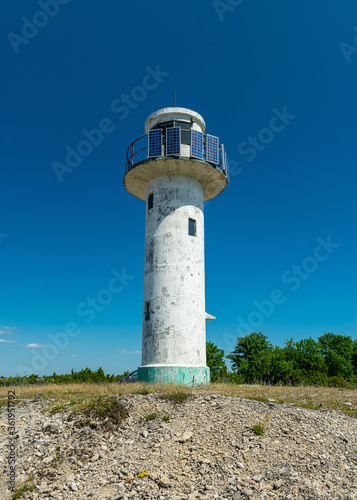 view of an old abandoned lighthouse by the sea  Saaremaa Island  Estonia
