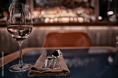 evening in a restaurant  blurred abstract background  bokeh  alcohol concept  wine glasses in a bar