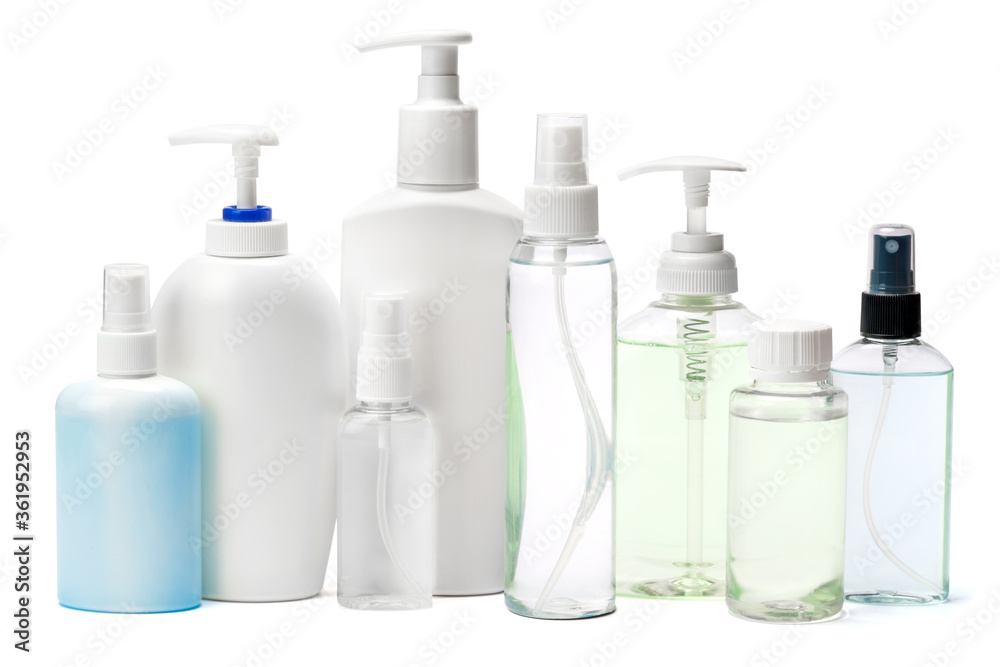 group of hand sanitizer spray and liquid soap bottles isolated on white background