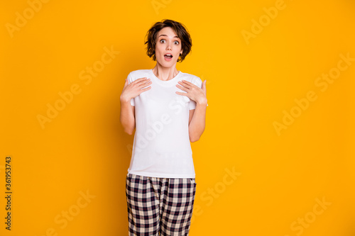 Portrait of astonished cute girl point herself hand impressed scream wow omg wear sleep outfit isolated over shine color background photo