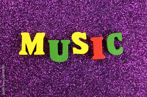 Music word made of bright colored letters photo