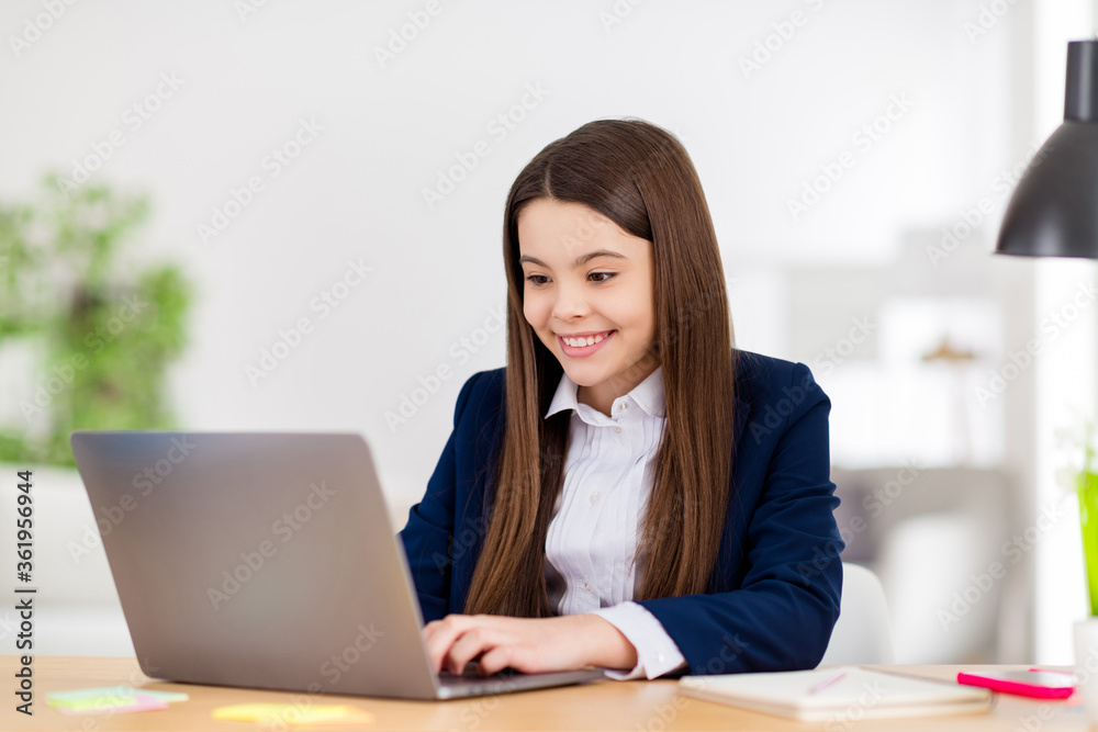 Photo of little pretty student school girl notebook online lesson video call sit desk distance quarantine study comfort 1 september autumn at home living room house classroom indoors Photo of little pretty student school girl notebook online lesson video call sit desk distance quarantine study comfort 1 september autumn at home living room house classroom indoors