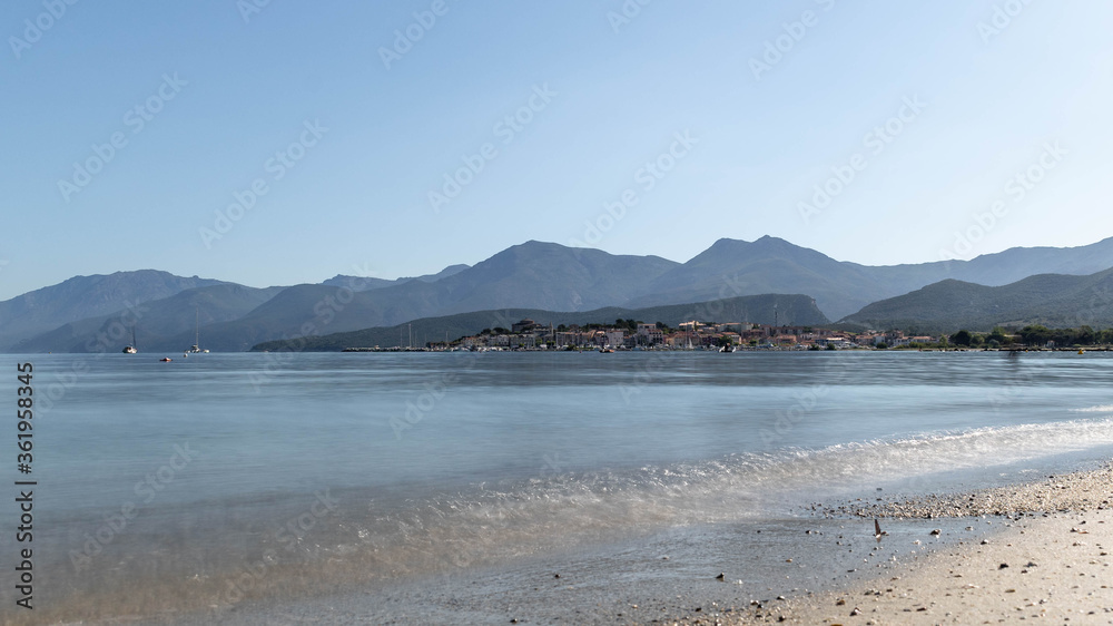 view of the sea and mountains in Saint-Florent bay in Corsica