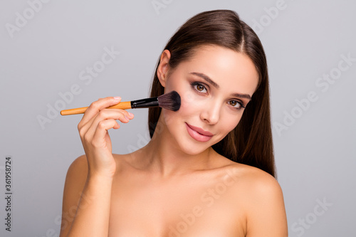 Portrait of charming pretty attractive girl apply make-up hold brush want be real beauty queen on glamour vogue meeting isolated over grey color background