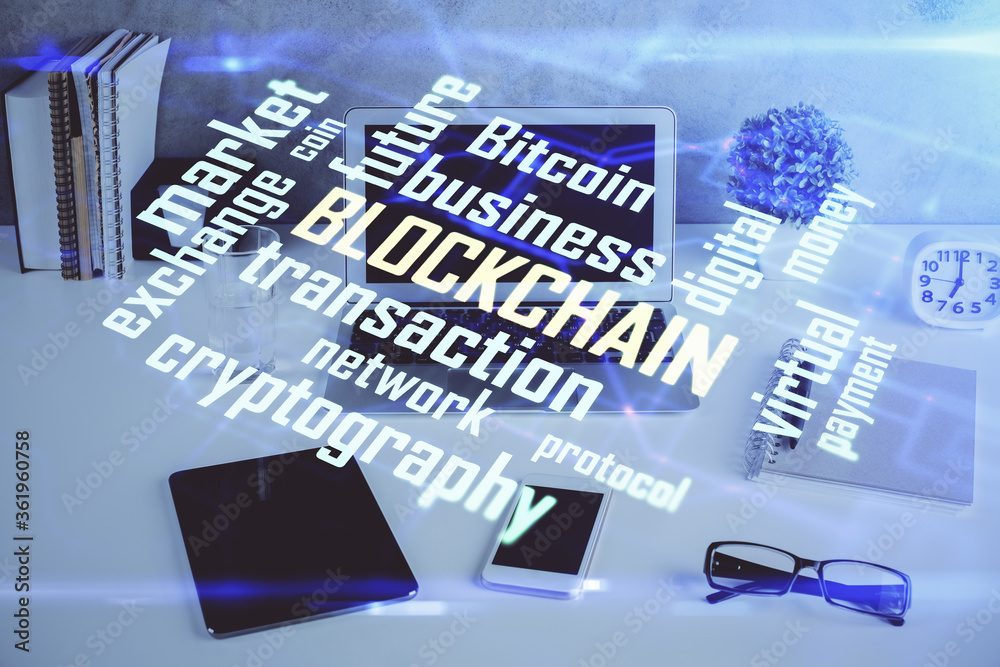 Double exposure of blockchain and crypto economy theme hologram and table with computer background. Concept of bitcoin cryptocurrency. Double exposure of blockchain and crypto economy theme hologram and table with computer background. Concept of bitcoin cryptocurrency.