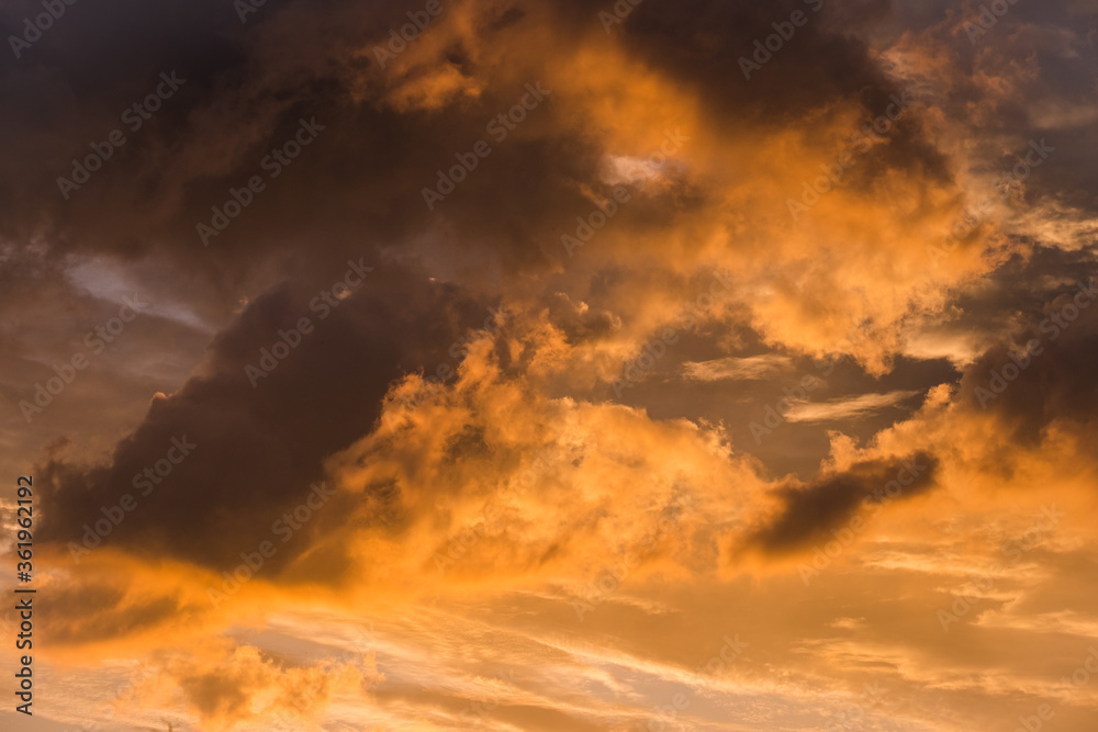 Dramatic orange clouds at sunset