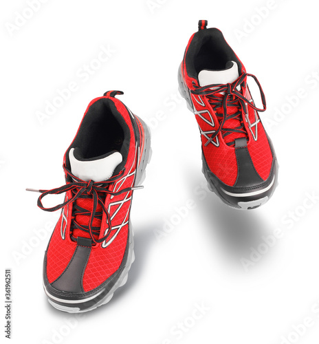 Fotografie Red running sport shoes going forward