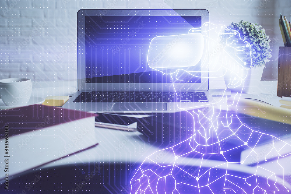 Naklejka premium Computer on desktop with AR theme icon. Multi exposure. Concept of augmented reality.