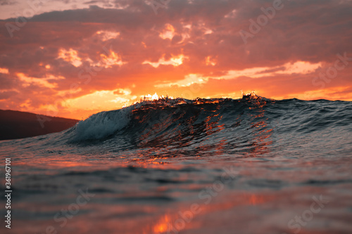 wave at sunset