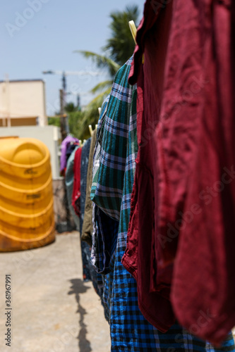 clothes are drying on the line. Selective focus.