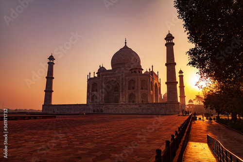 A beautiful view of the Taj Mahal seen in the golden light during Sunrise