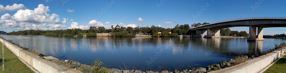 Naklejka premium Beautiful sunny day panoramic view of Parramatta river and bridge near Ermington, New South Wales, Australia