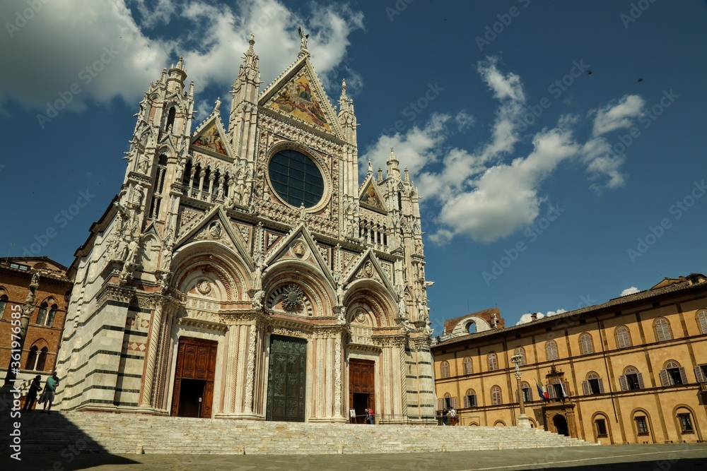 Empty square without tourists in front of cathedral basilica in Sienna because of Covid-19