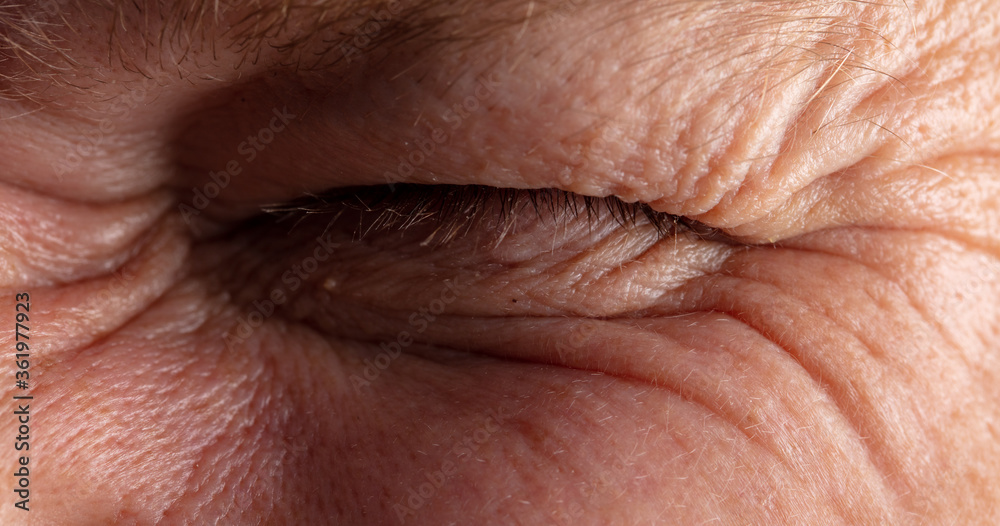 Close up of man’s closed eye.