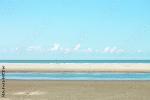 Fototapeta Naklejka Na Ścianę i Meble -  Beautiful ocean landscape with clouds in blue tones. Summer dream concept
