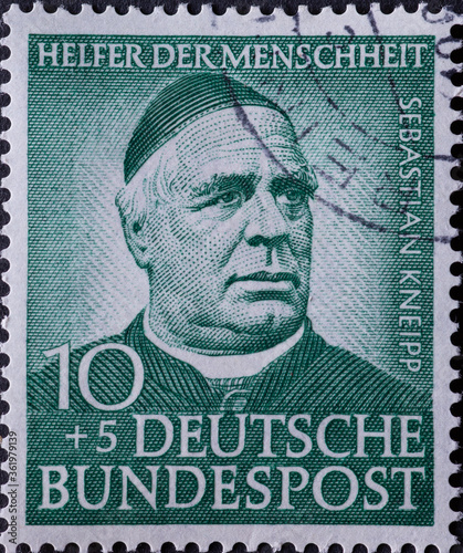 GERMANY - CIRCA 1953: a postage stamp printed in Germany showing an image of sebastian Kneipp, circa 1953. photo