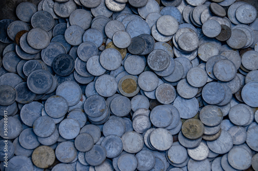 stack of coins on blue background stack of coins on blue background
