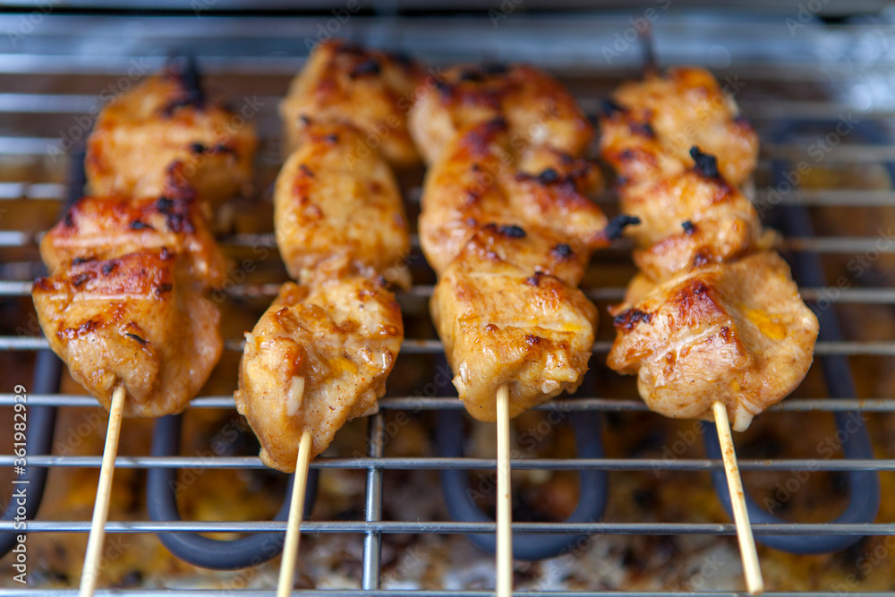 Delicious grilled chicken sate on BBQ