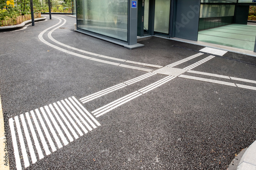 Wallpaper Mural Guidance strips on the ground for the guidance and orientation of blind and partially sighted people in Geneva, Switzerland Torontodigital.ca