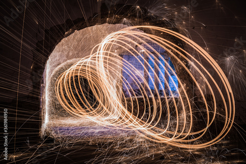 Spinning steel wool fireworks tunnel spiral.