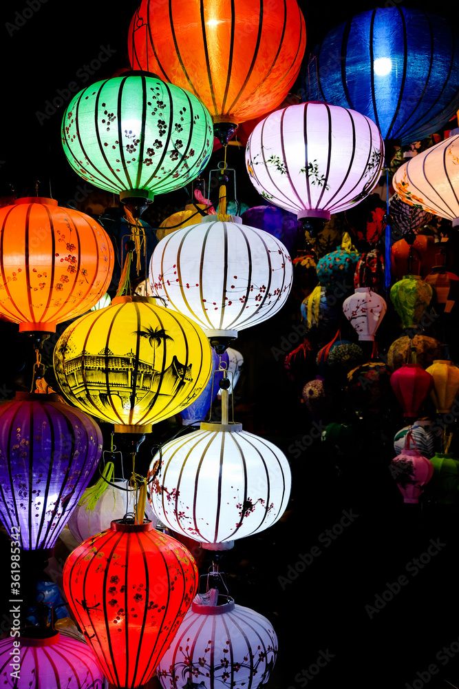  Hoi An Ancient Town with colorful lanterns lighting up at night.