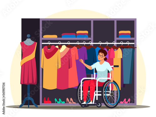 Disabled woman in wheelchair shopping, buys clothes in store